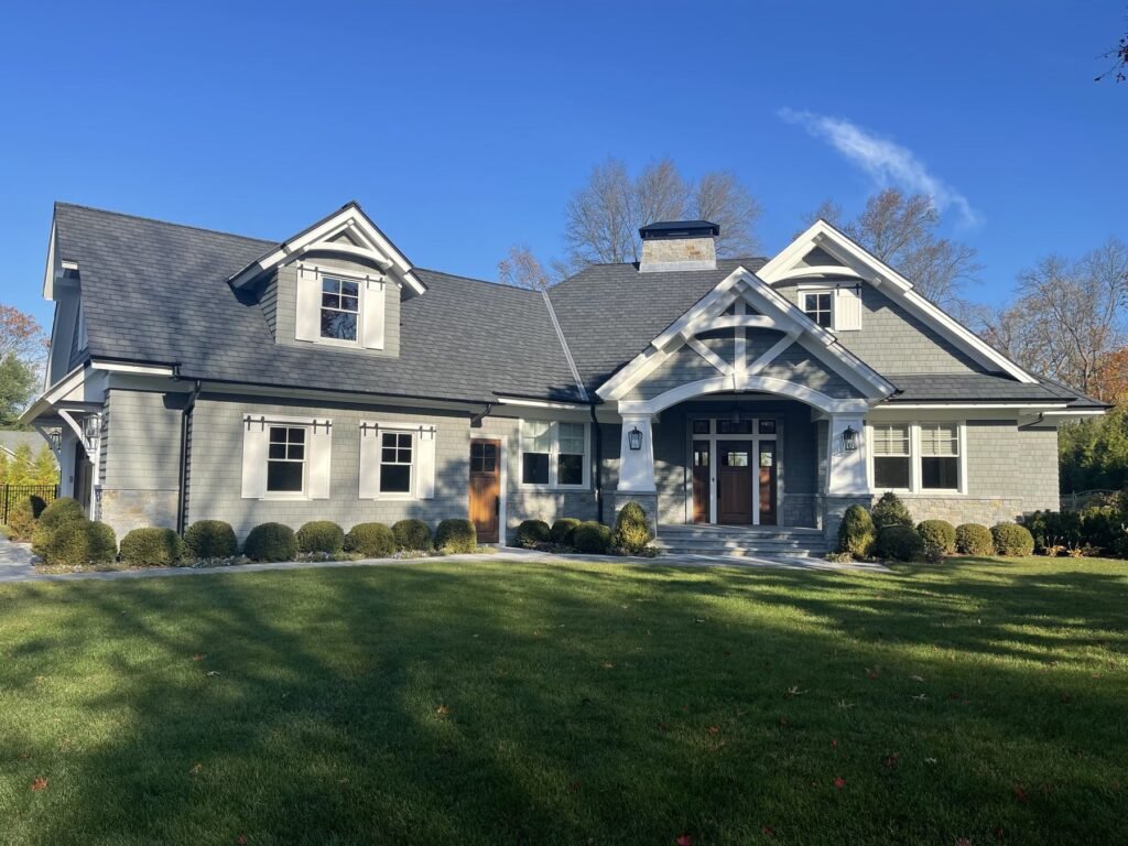 A residential roof at dusk for our comprehensive roof repair guide Hempstead NY
