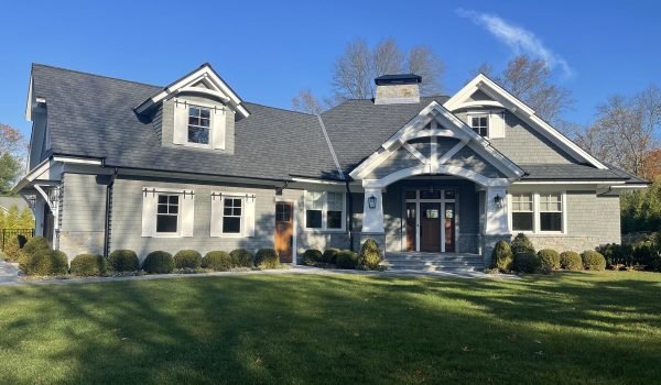A residential roof at dusk for our comprehensive roof repair guide Hempstead NY