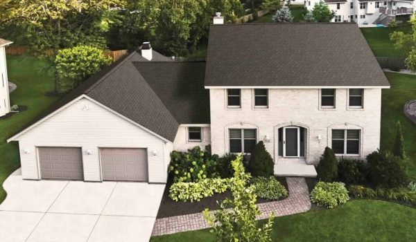 roofing scam signs Long Island homeowner reviewing contractor estimate