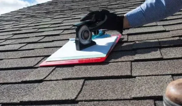 Professional roof inspection to detect salt air roof damage Long Island on asphalt shingles